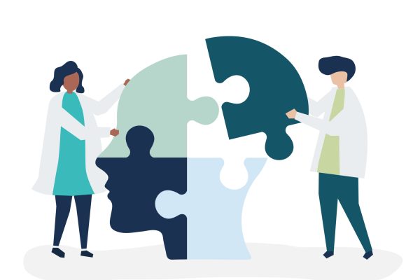 People connecting jigsaw pieces of a head together